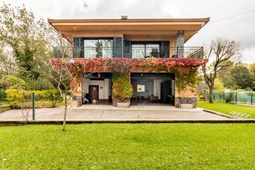 Quart Ski Chalet | Ca La Iaia Casa con piscina y jardín