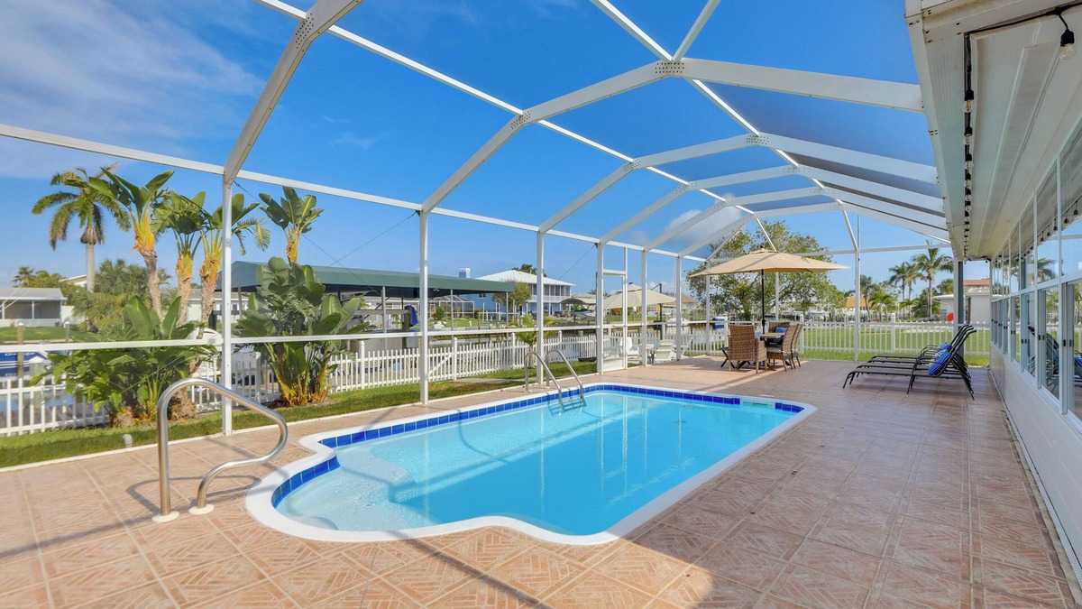 Bay Colony House | Canal-Front Haven: Pool, Dock & Lanai in Palmetto