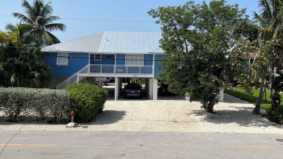 Breezeswept Beach Estates House | Canal Front Home to Dock and lift your boat in Lower Keys Paradise