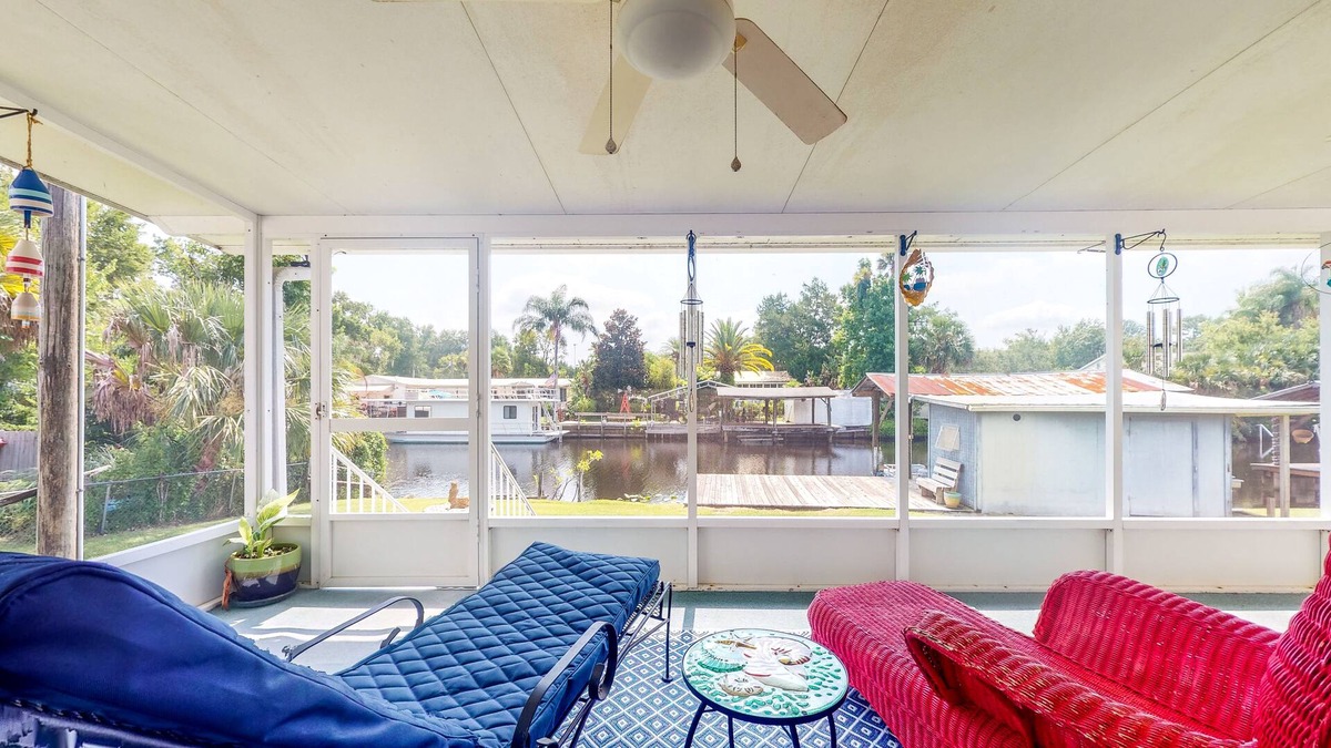Astor House | Canal-Front Home with Private Covered Boat Dock & Waterfront Screened Porch