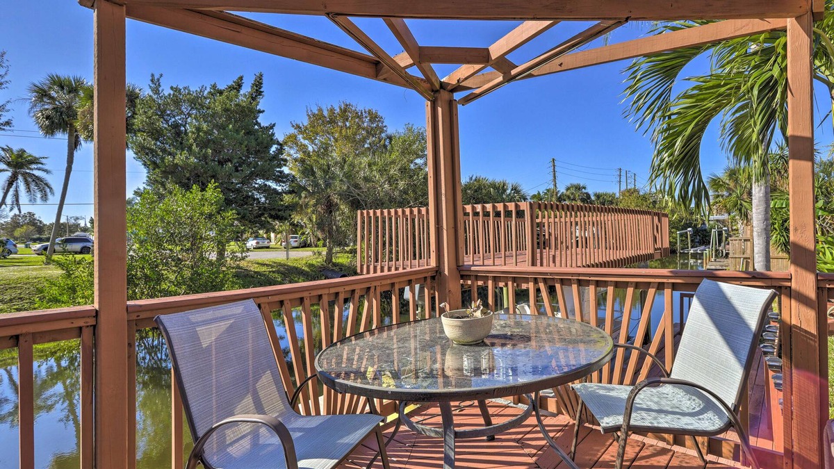 Skylark Estates Cottage | Canal-front Merritt Island Home w/Deck + Grill!
