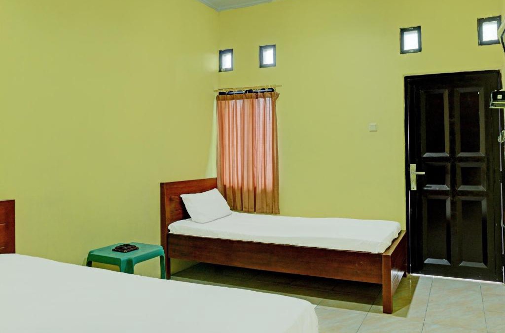 South Ogan Komering Ulu Hotel | Capital O 92316 Wisma Widya Loka Pratama Near Futsal Tebing Gading