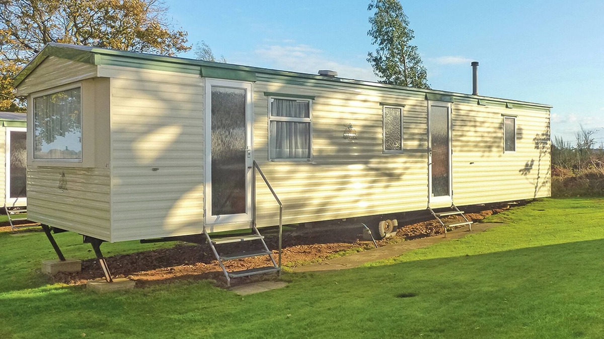 Sandown House | Caravan with one double and two twin.