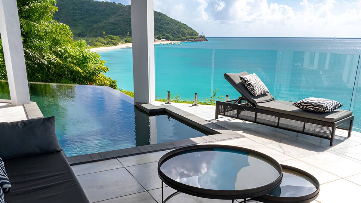 Fryes Beach Hotel | Caribbean Bliss Awaits in This Luxurious Beachside Villa with Dining Area