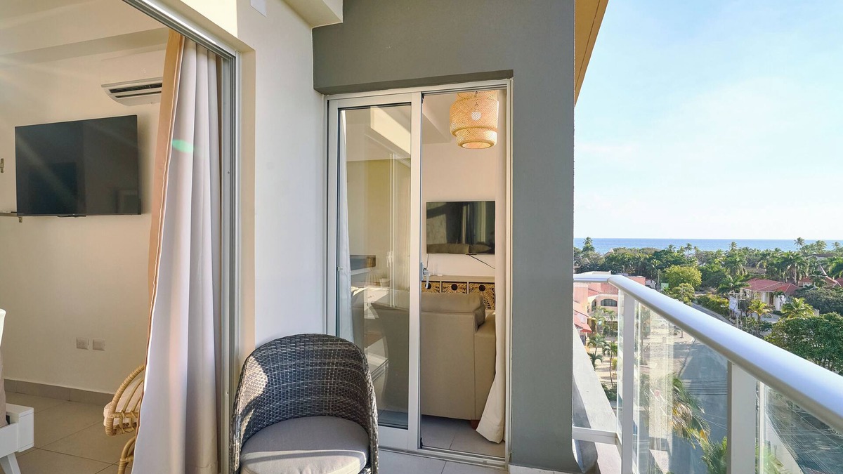 Quisqueya Apartment | Caribbean Sunset Soak Apt.In the center of town, steps from the Juan Dolio Beach