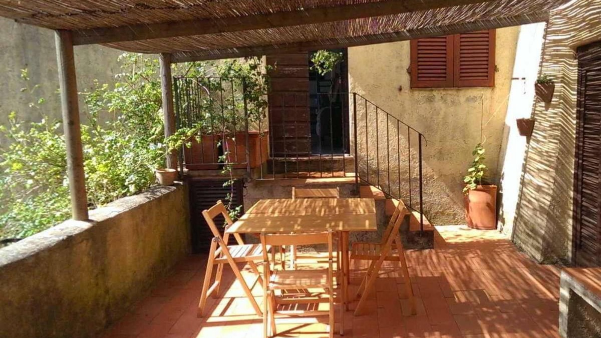 Capalbio Apartment | Casa Blu - private garden, parking, privacy and view