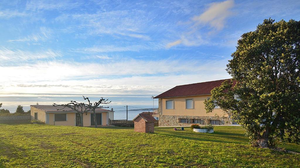 A Lanzada House | Casa con vistas al mar en Playa de Foxos