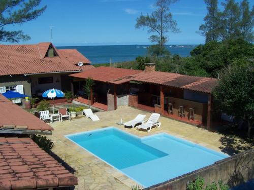 Rio das Ostras House | Casa de seis suites na beira do mar