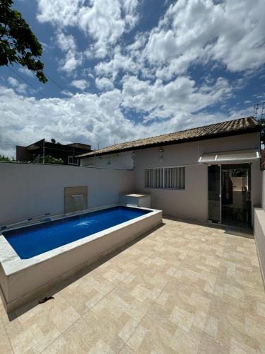 Tupy House | Casa em Itanhaém com Piscina e Ar condicionado à 900 Metros da Praia