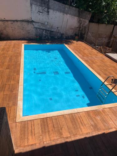 Piumhi House | Casa para festas com piscina e cama elástica