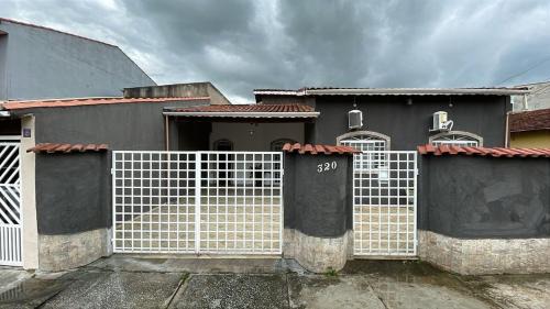 Aparecida House | Casa Pequena Coração Grande