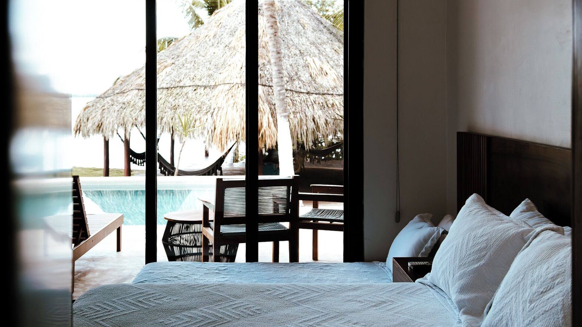 Othon P. Blanco Villa | Casa Xchel in front of the bay, pool, jacuzzi and deck.