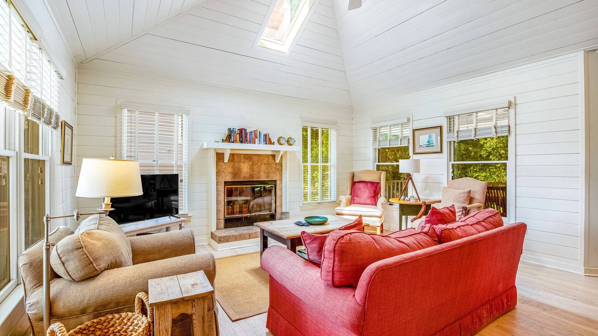 Pelican Bay House | Casual cottage w/screened porch & shared pool - walk to the beach