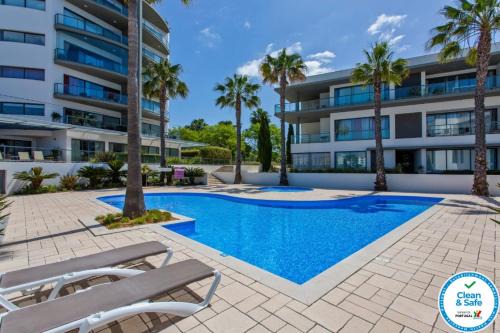 Quarteira Apartment | Cavalo Preto Beach Residence with Garden & Pool
