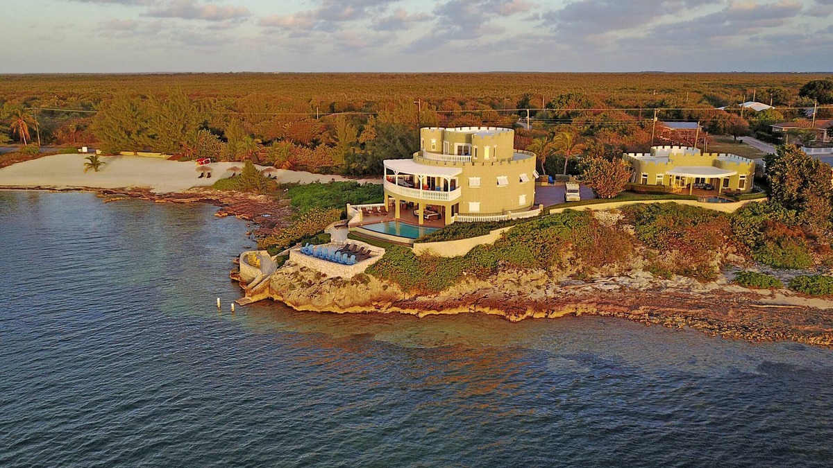 Gun Bay House | Cayman Castle: Luxury Gated Estate w/Elevated Views, Infinity Pool + Large Private Beach