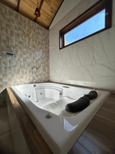 Lumiar Ski Chalet | Chalé dos ipês