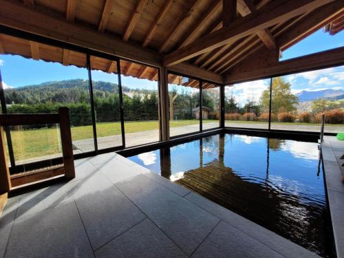 Les Gets Ski Chalet | Chalet Les Sauvageons - Grand luxe au cœur des Gets, avec piscine & hammam MAE-2431