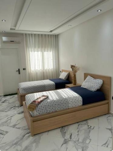 Agdal House | Chambre à Agdal Rabat dans un appartement partagé
