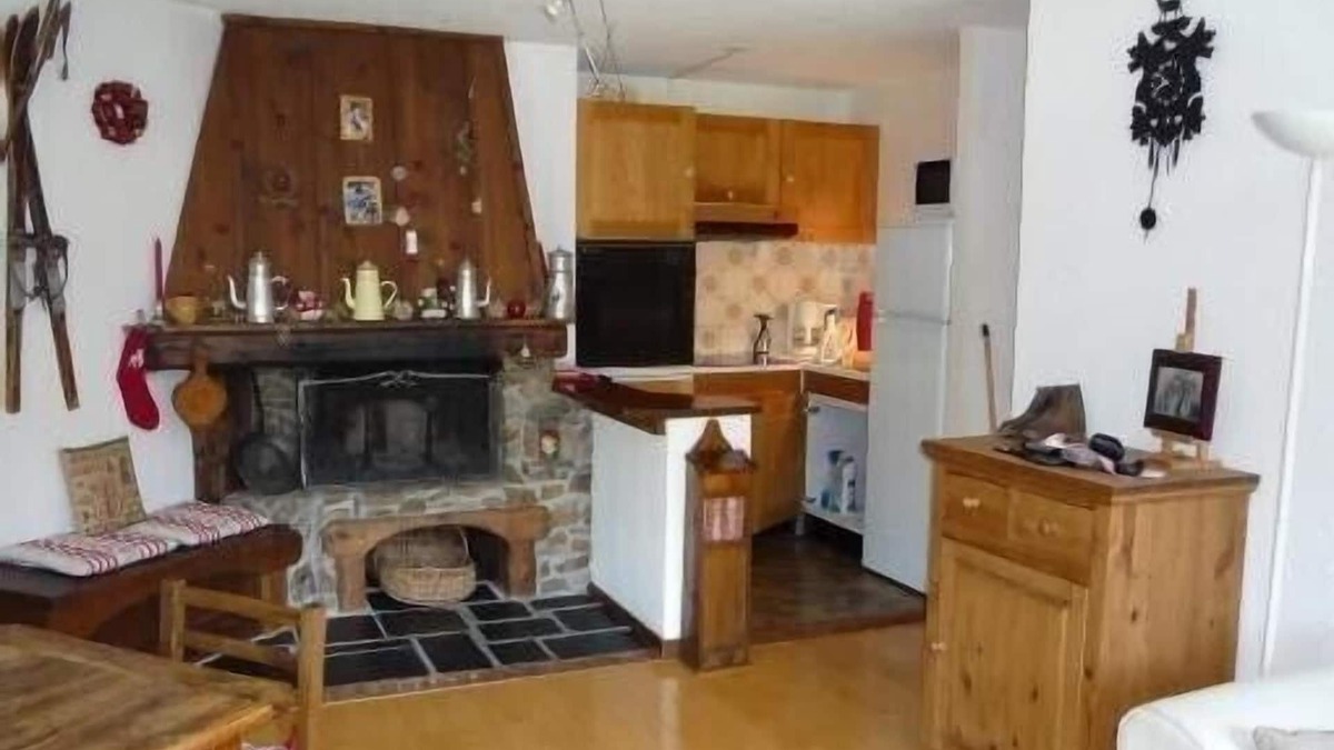 Megeve Apartment | Character apartment with fireplace in residence with summer swimming pool.