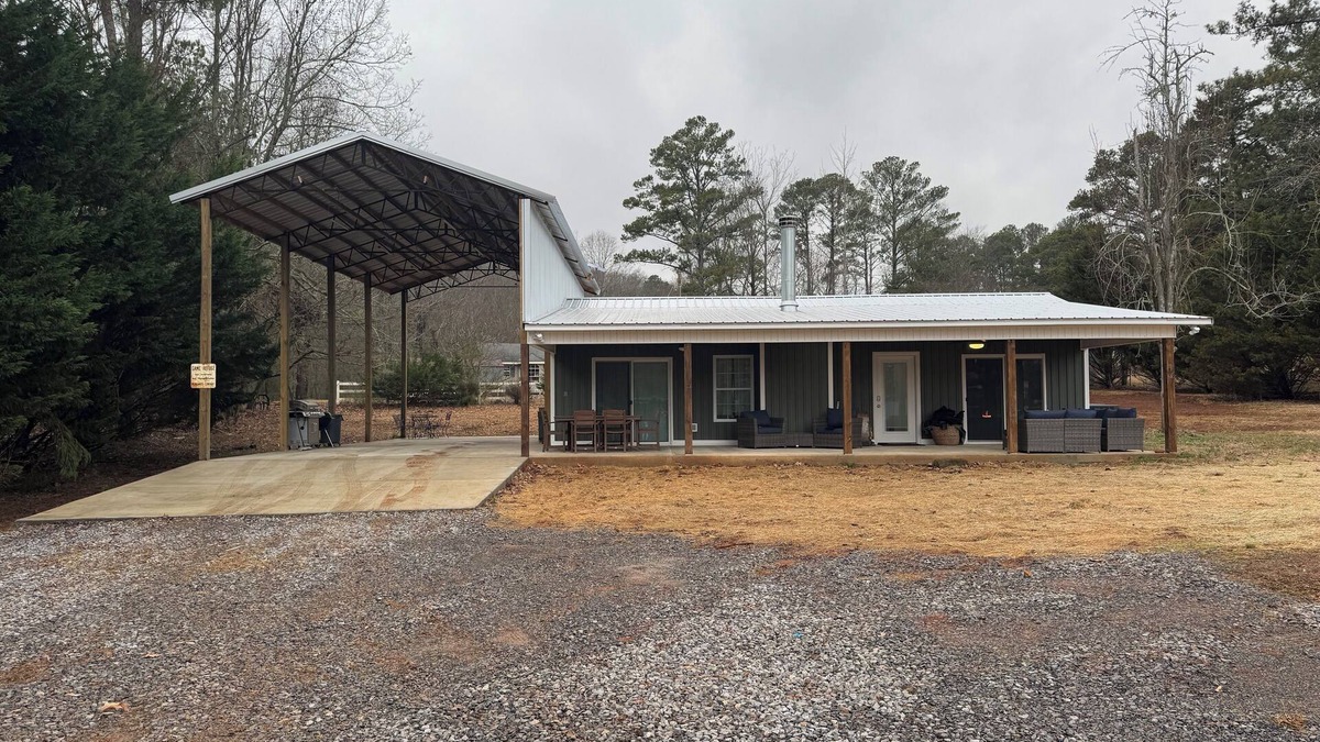 Guntersville Cabin | Charming 2-bed 2-bath cabin with views of Lake Guntersville from every room.