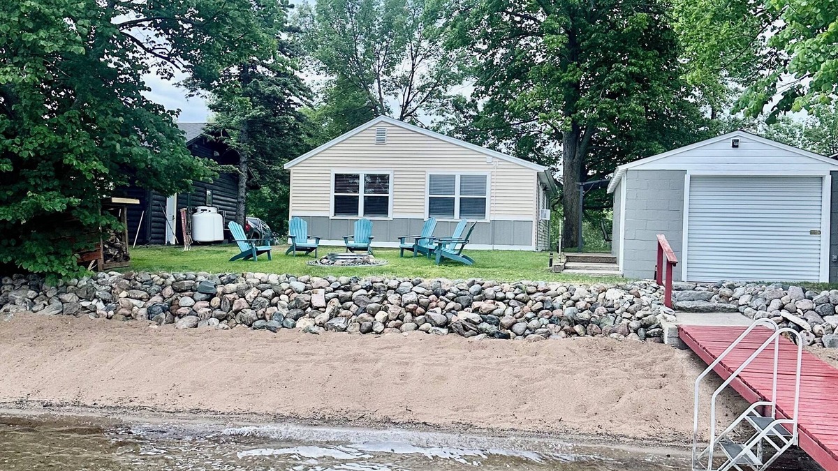 Dent Cabin | Charming 3-bedroom cabin right on the sandy shore of beautiful Star Lake.