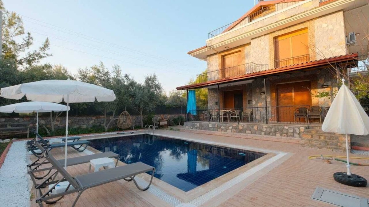 Fethiye House | Charming 4-bedroom estate with WiFi, swimming pool and AC in enchanting Fethiye