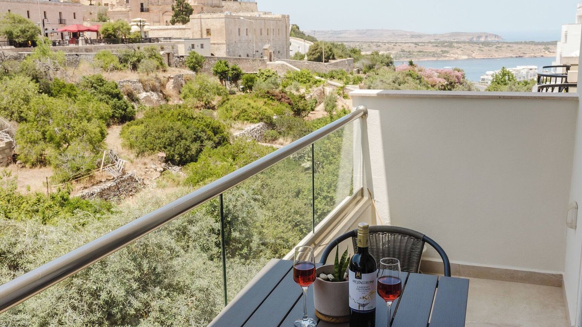 Mellieħa Heights Apartment | Charming apartment just steps from Mellieha’s main street and 5 minutes from the beach. Includes 2 double bedrooms, 1 twin room, Wi-Fi, Smart TV, coin-operated A/C, and all essentials like towels, linen, washing machine, and kitchen app