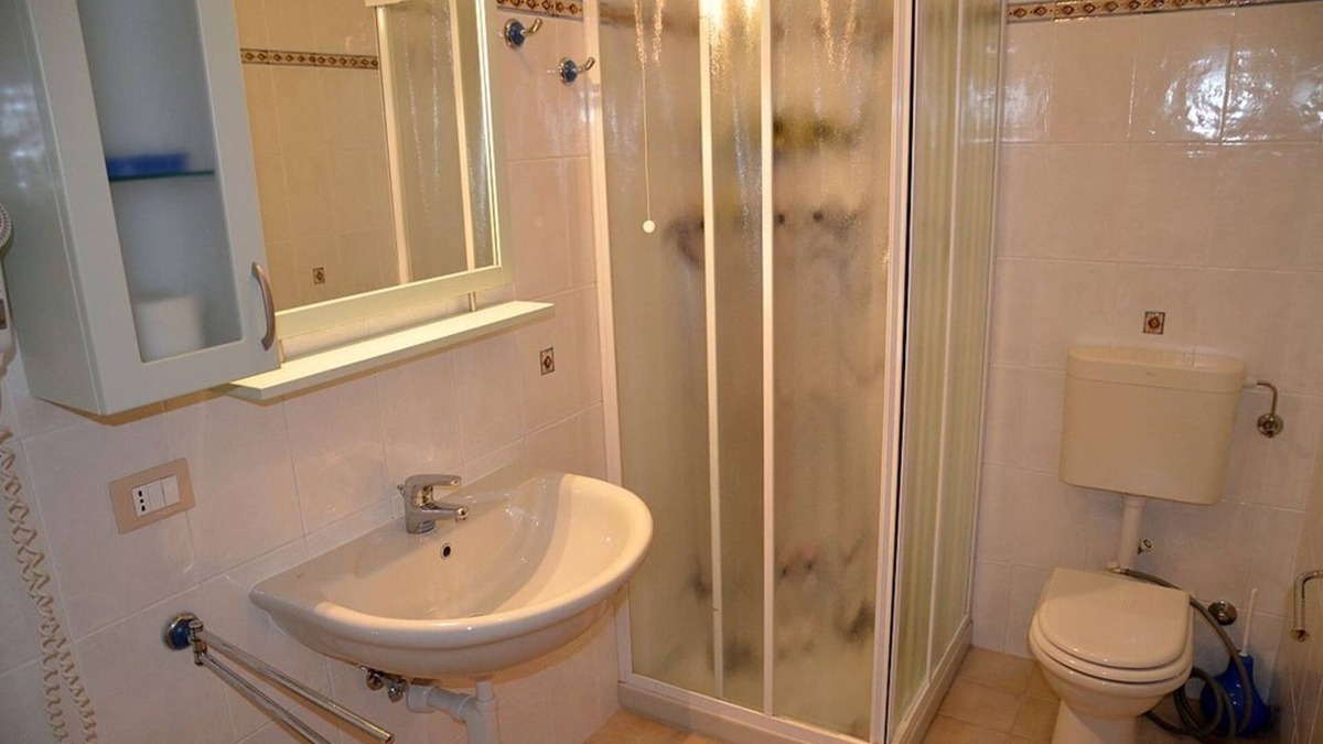 Bibione Pineda Apartment | Charming apartment with solarium in an elegant residence with pool