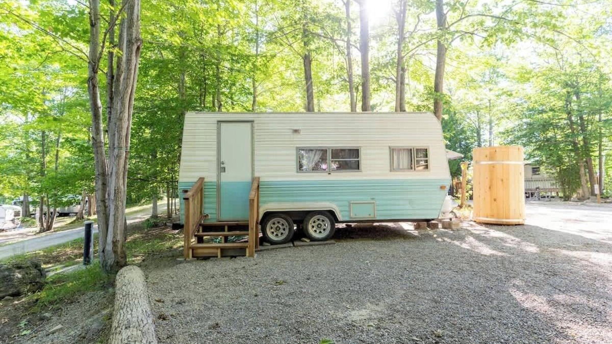 Miller Lake House | Charming Blue Glamping RV Close to Grotto