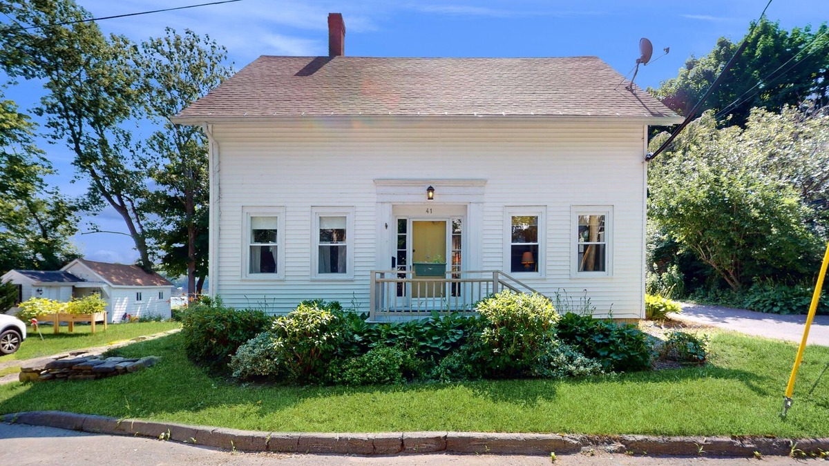 Bath House | Charming Cape-style House with Panoramic River Views and Modern Amenities