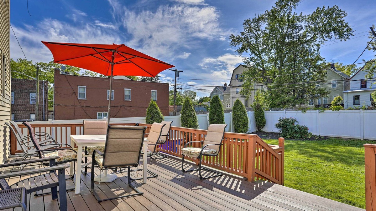 East Orange House | Charming, Colonial Home w/ Deck & Fenced Yard