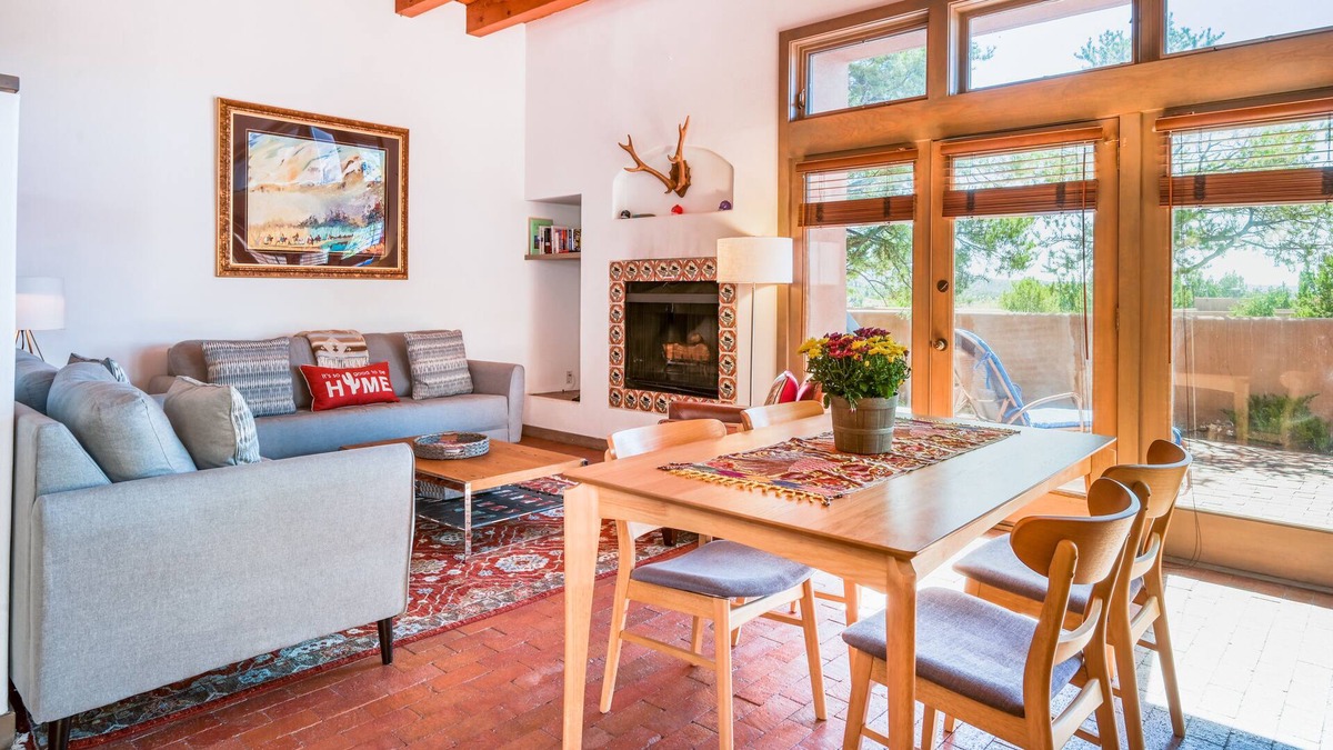 Nambe Pueblo Apartment | Charming condo with fireplace, patio, grill, W/D, & pool - quiet location