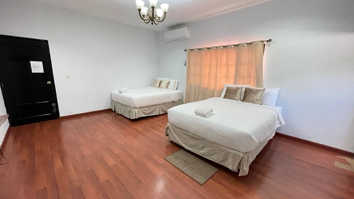 San Pedro Sula Hotel | Charming hotel with 1 bedroom and AC, WiFi in vibrant San Pedro Sula