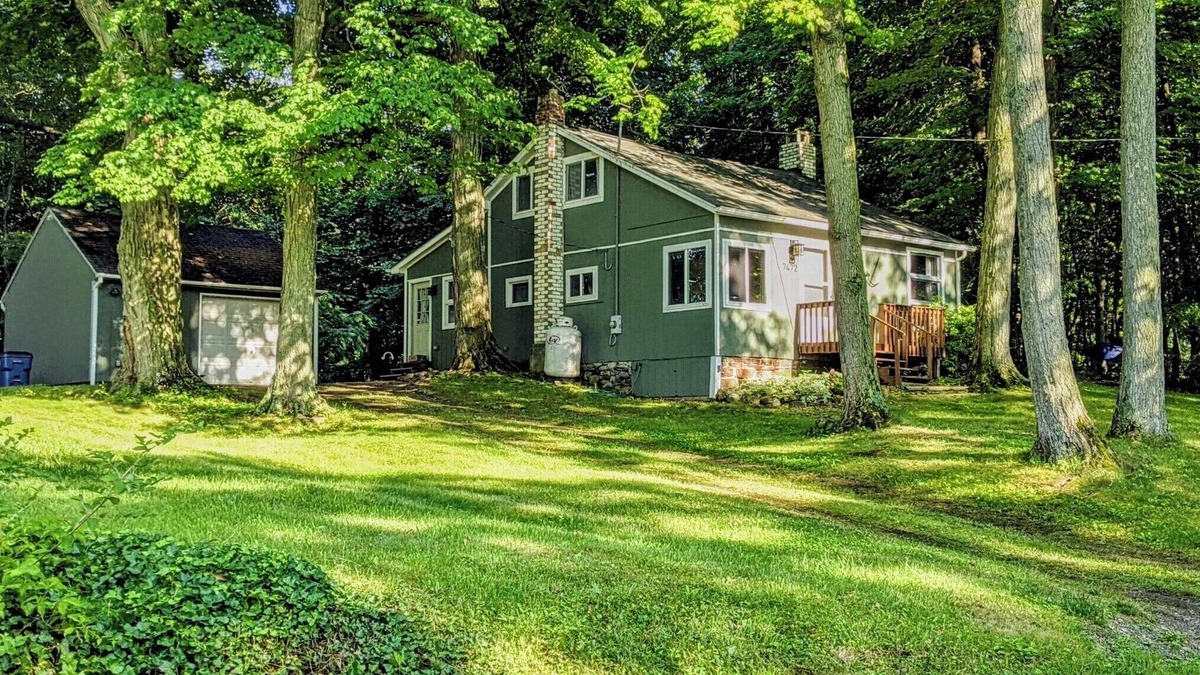 Sodus Point Cottage | Charming Island cottage with dock, accessible by car and boat