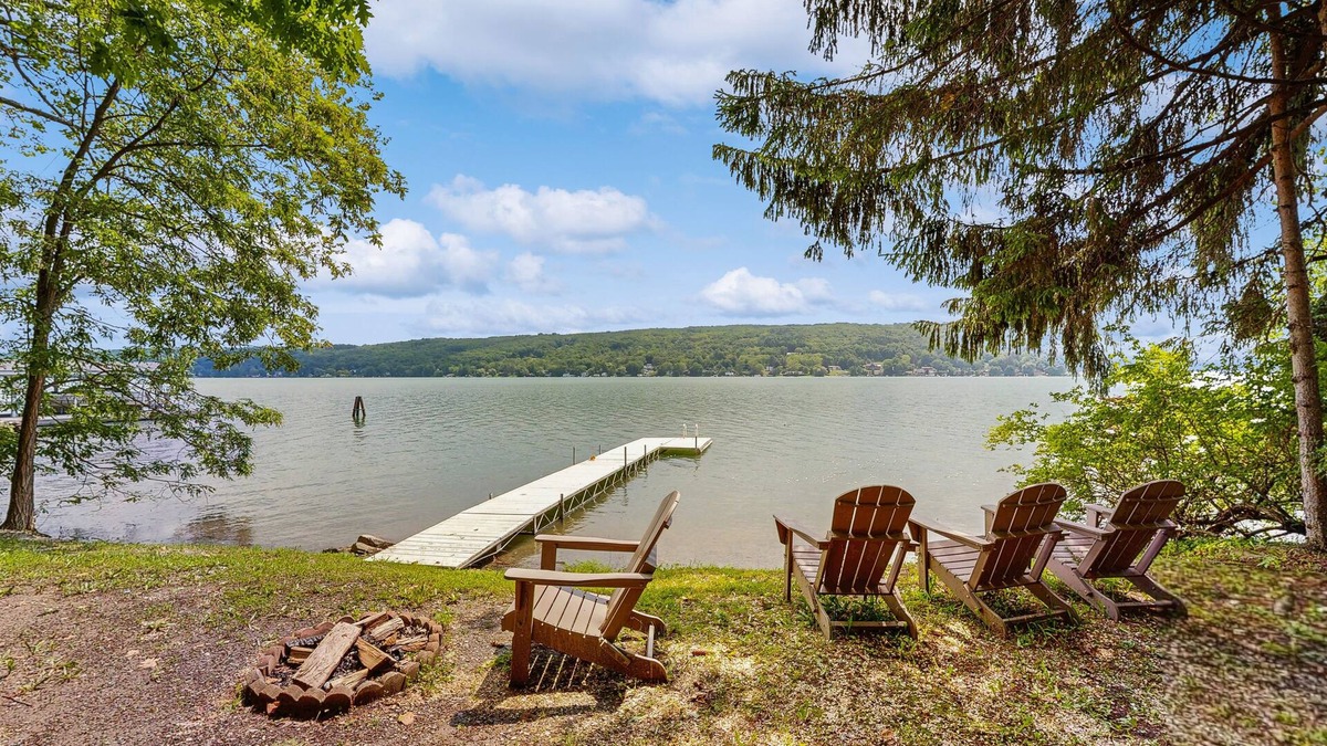 Town of Jerusalem House | Charming lake view home w/dock, pergola and grill & lake side fire pit