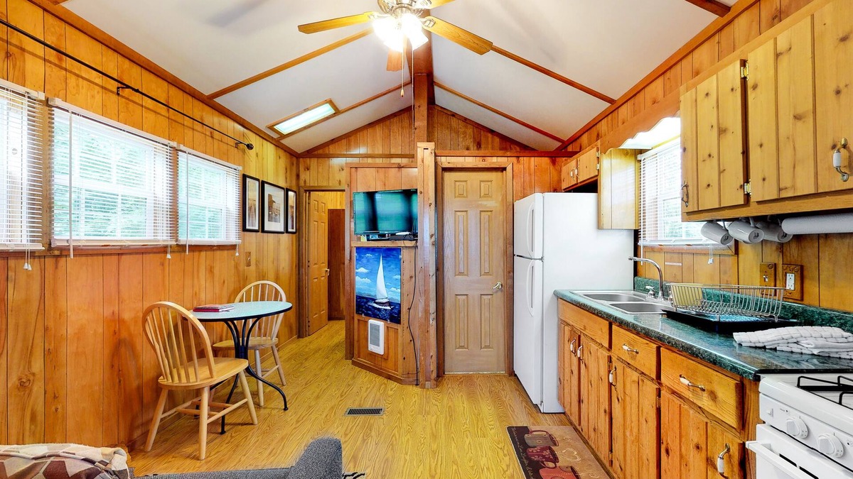 Leesville House | Charming lakefront cabin on two acres with dock & firepit