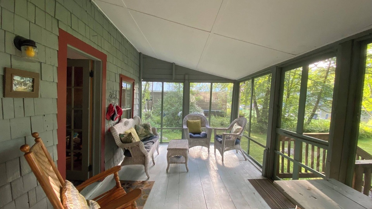 Rome Cabin | Charming lakefront cabin with large screened-in porch and lawn in Rome