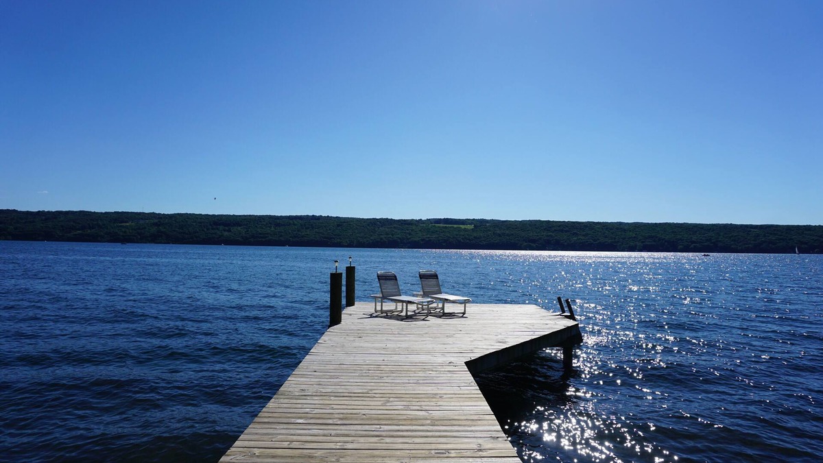 Burdett Cottage | Charming lakefront cottage with private beach and boat dock.