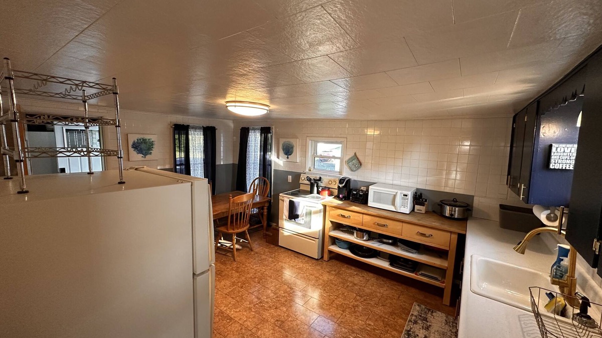 Washburn House | Charming New England Cape just feet from Snowmobile and ATV Trails!
