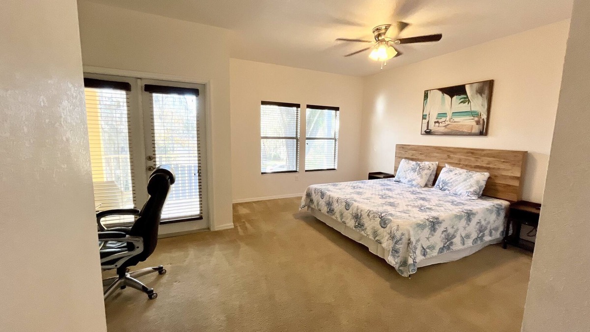 Gainesville Condo | Charming Spanish-style condo nestled in the quiet Royal Park area of Gainesville