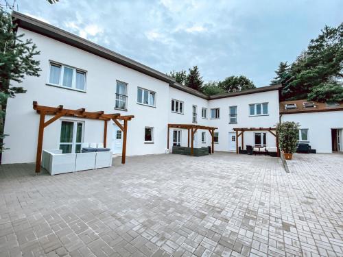 Pnovany Resort | Chaty a Apartmány Hracholusky Kemp Kosatka