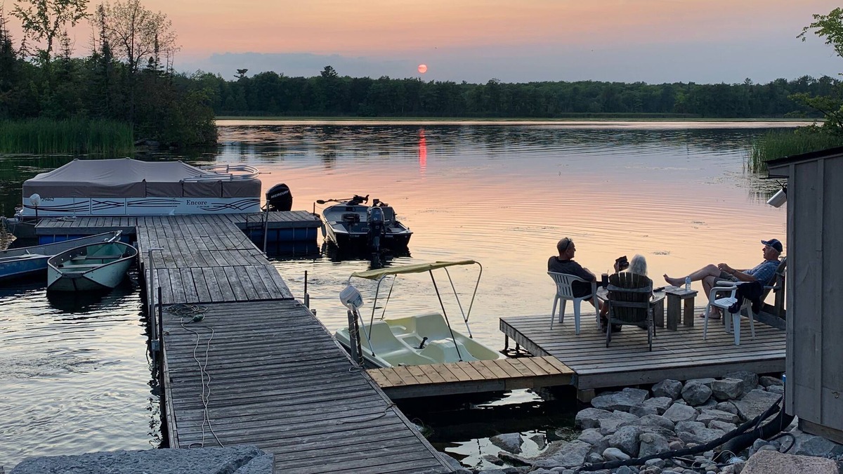 Trent Lakes Cottage | Cheerful new 3 bedroom cottage on the water with beautiful sunset view