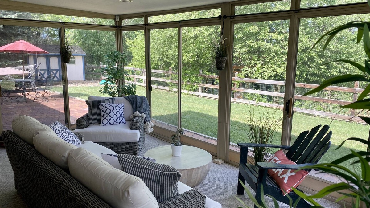 Southeast House | Cheerful three bedroom with stunning sunroom!