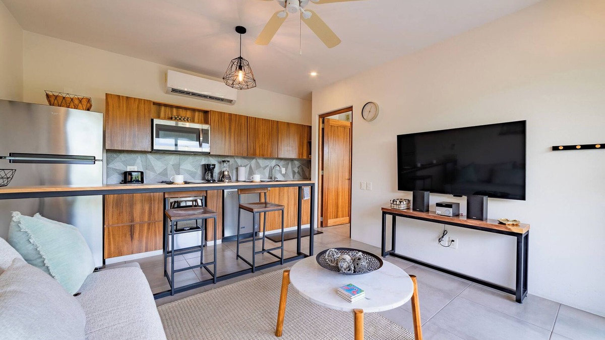P Chahue Condo | Chic Central Living: 1-Bedroom Condo Rental in Prime Location
