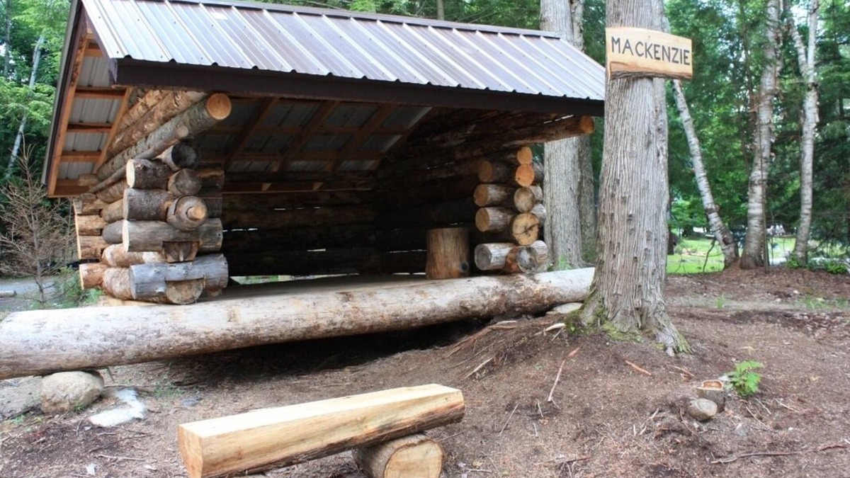 Saranac Lake House | Classic Adirondack Lean-to with shower, fire pit, dock and waterfront