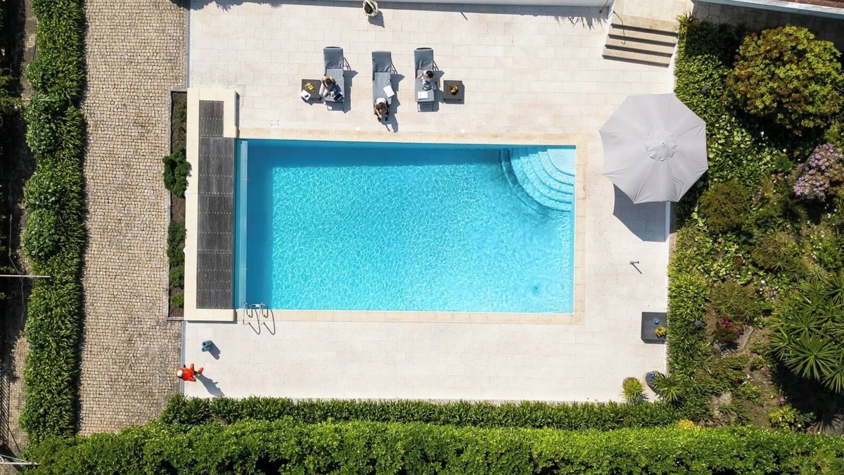 Paredes House | Classic Villa w/Gym and Pool Access by HostWise