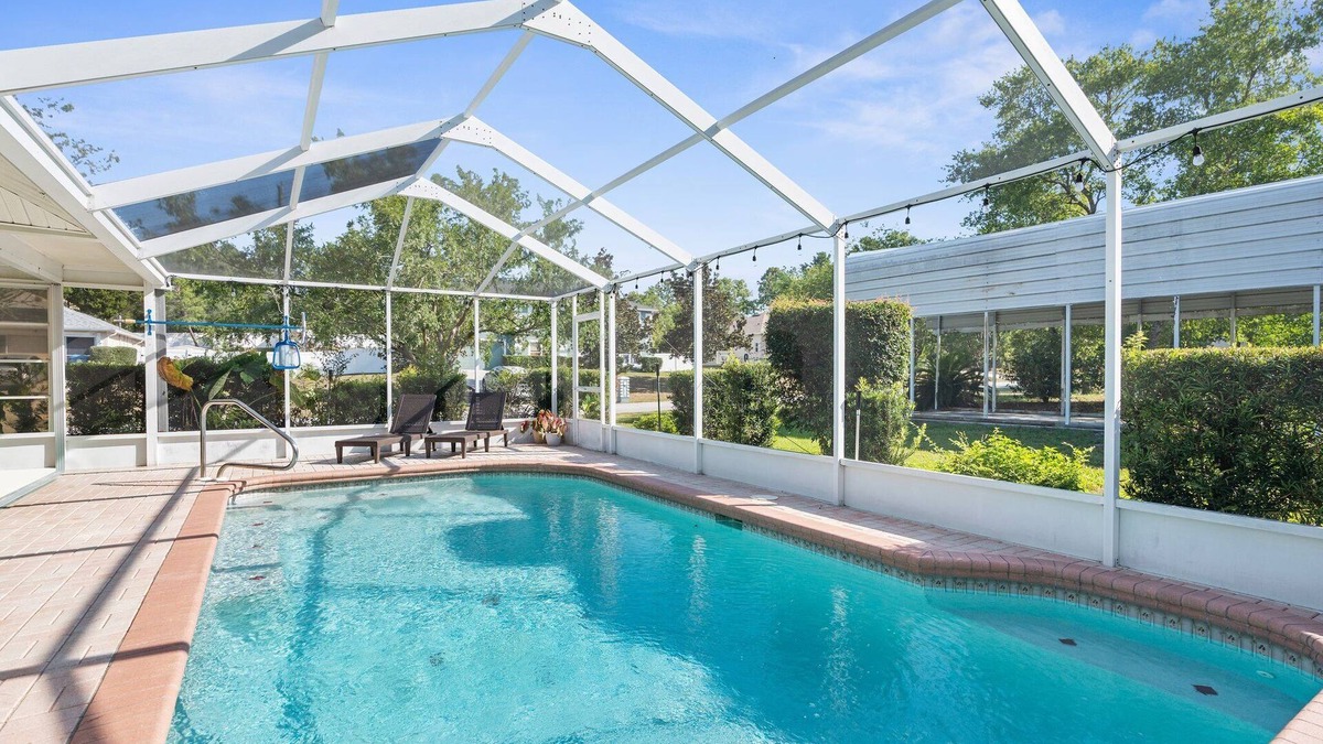 Spring Hill House | Clean, spacious home with heated pool near Weeki Wachi Springs!