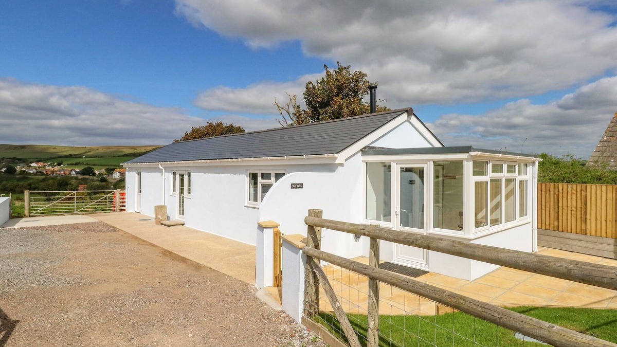 Bridport Cottage | CLIFF BARN, pet friendly, with open fire in Burton Bradstock