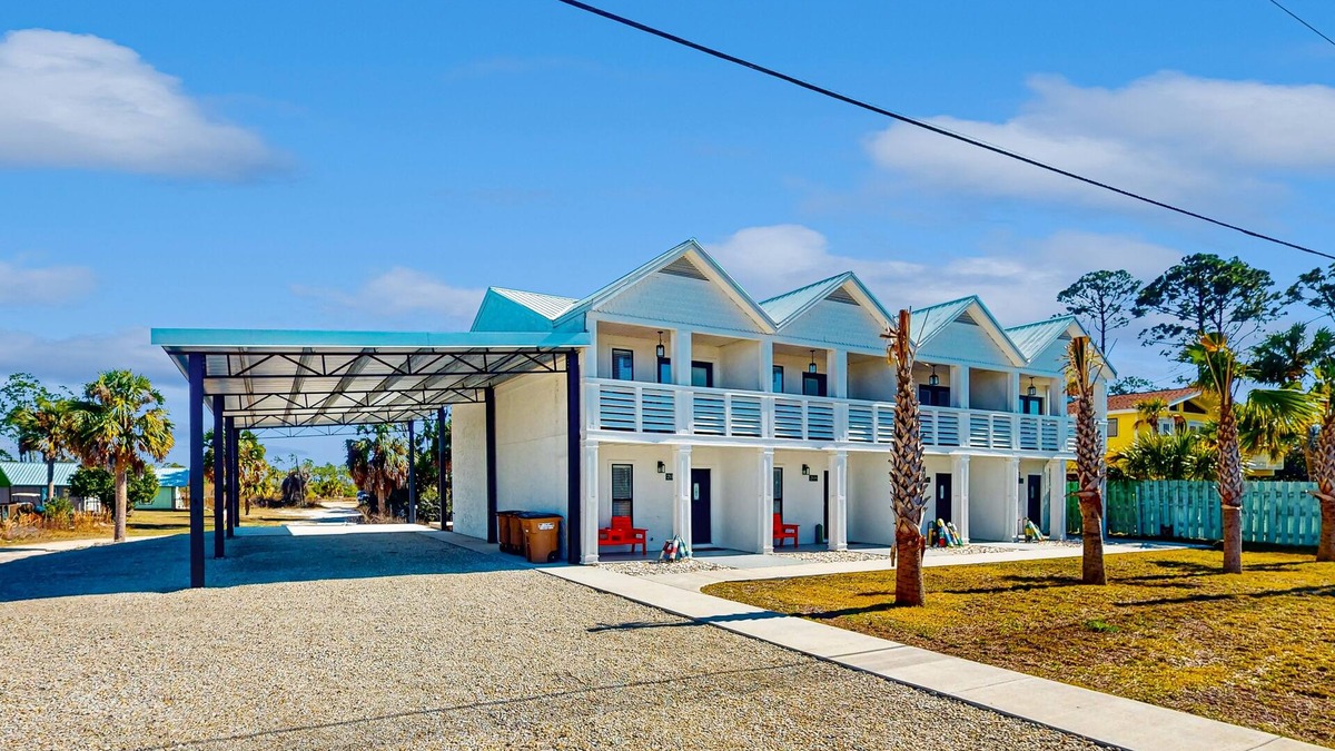 Port St. Joe House | Coastal getaway steps from the bay with patio, open layout, smart TVs, & W/D