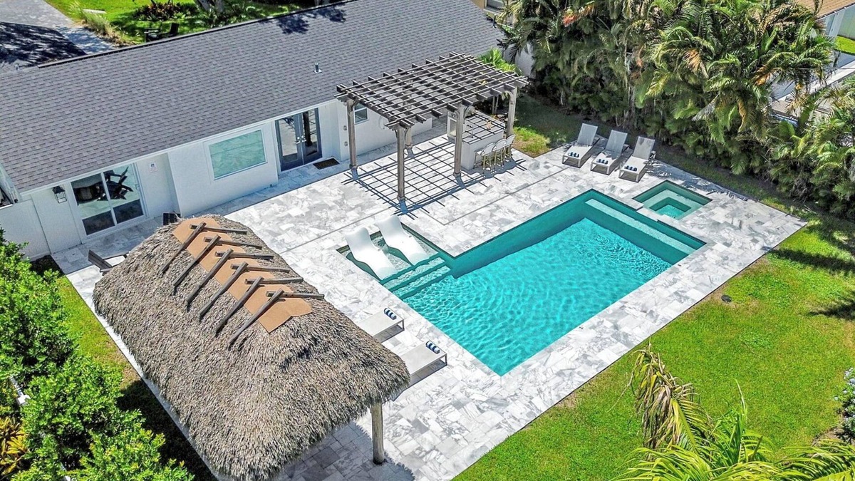 Naples Park House | Coastal Getaway w/Pool, Spa & Tiki Lounge